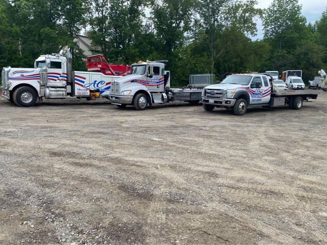 AC Towing and DK Auto Sales tow truck