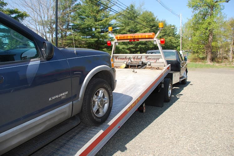 Country Club Garage tow truck