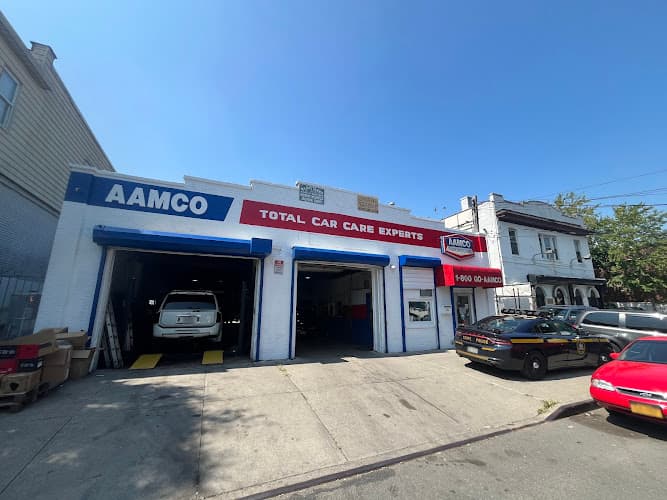 AAMCO Transmissions & Total Car Care tow truck