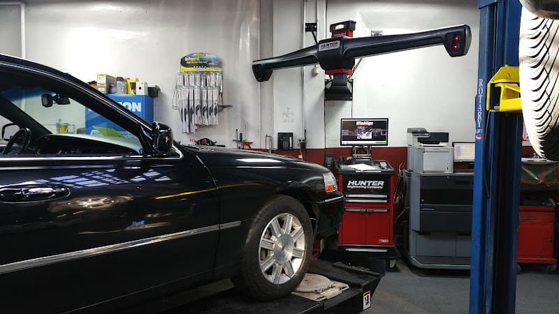 Precision Auto Works (Auto Repair & Maintenance) tow truck