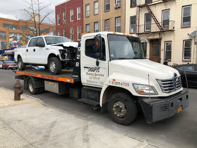 Snoopys Towing Service NYC tow truck