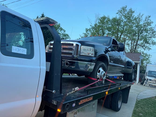 Navy Towing and Recovery LLC tow truck