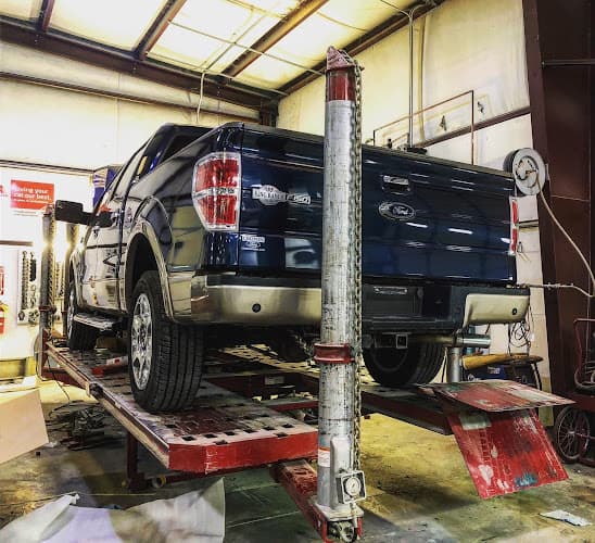 Powhatan Collision and Glass LLC tow truck