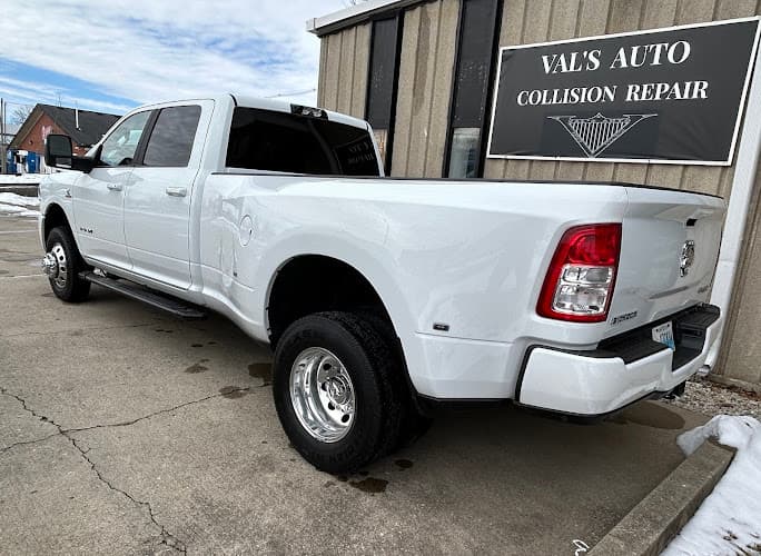 Vals Auto Collision Repair LLC tow truck