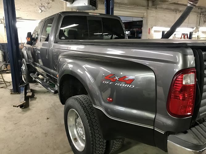 AAMCO Transmissions & Total Car Care tow truck