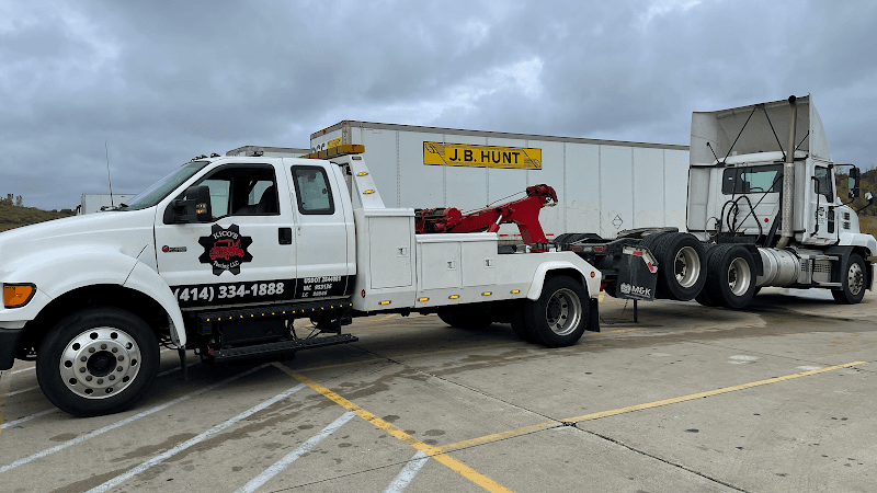 Kicos Towing LLC tow truck