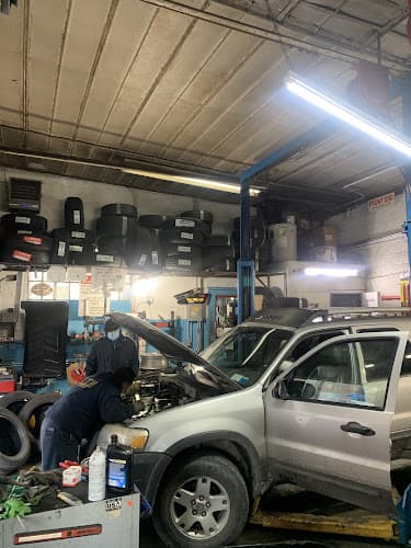 Benson''s tire and mechanic shop corp tow truck