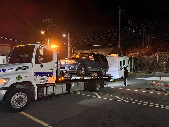 Towboyz973 Towing & Junkin tow truck