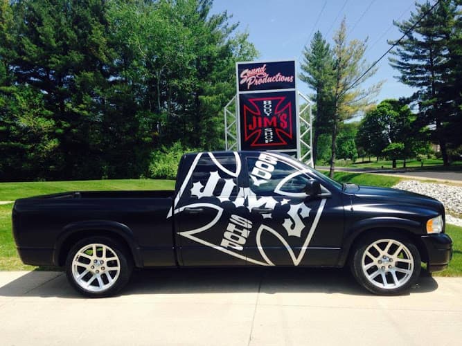 Jim's Body Shop tow truck