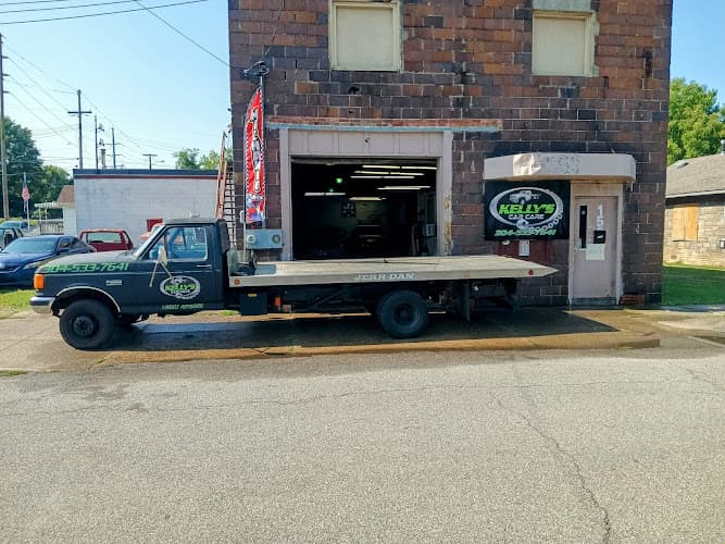 Kelly's Car Care and Towing. (Home of the 65 dollar Tow) tow truck