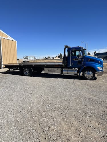 Hooper services tow truck