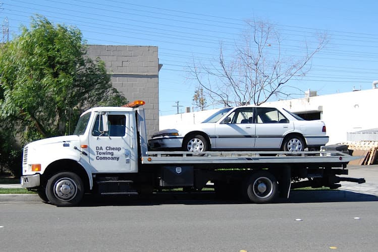 DA Cheap Towing Company tow truck