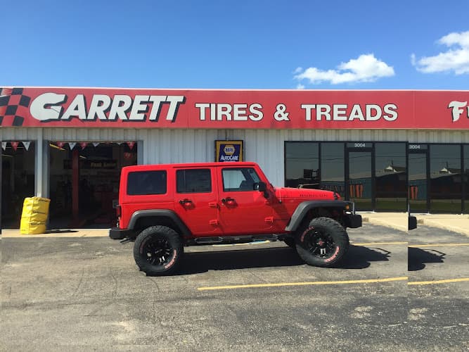 Garrett Tires & Treads tow truck