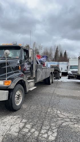 Russell & Sons Towing & Recovery tow truck