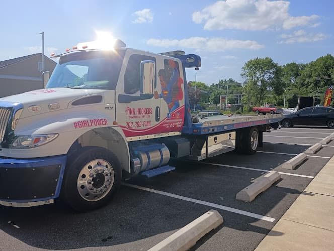 Pink Hookers Towing and Services tow truck