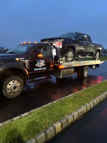 Ariel's Towing & Recovery tow truck