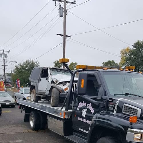 Alpha Auto tow truck