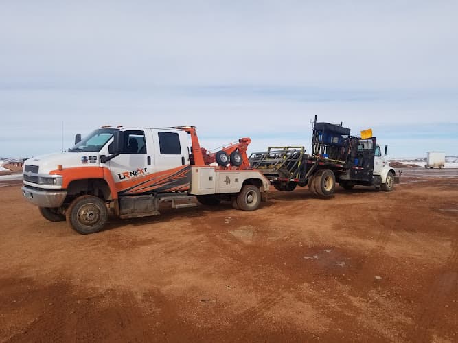 U R NEXT TOWING tow truck