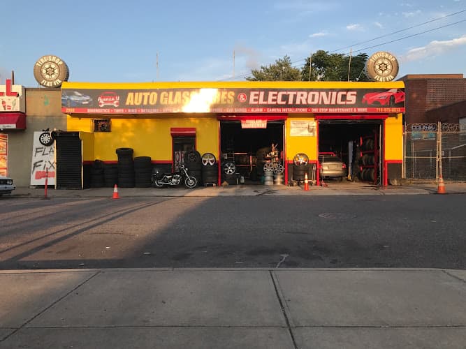 Avenue U AutoGlass, Tires & Electronics tow truck