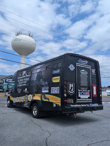 Meineke Car Care Center tow truck