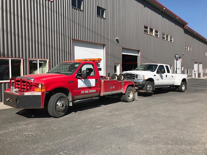 Courtesy Towing tow truck