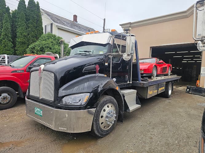 Carrara’s Services tow truck