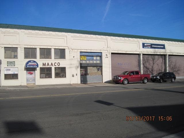 Maaco Auto Body Shop & Painting tow truck