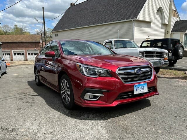 Academy Auto Sales and Collision tow truck