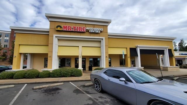 Mr. Tire Auto Service Centers tow truck