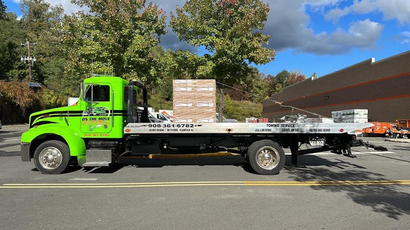 On The Move - Heavy Duty Towing - Fleet Maintenance tow truck