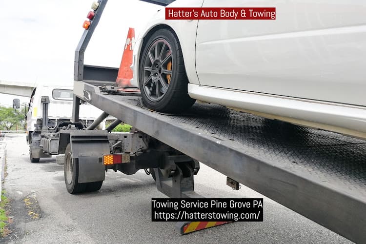 Hatter's Auto Body & Towing - Auto Body Repair Shop - Wrecker & Towing Service tow truck